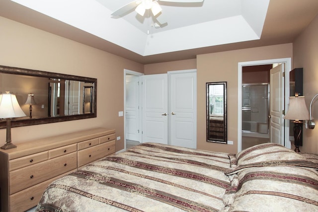 11646 Evergreen Ln, Huntley, IL 60142 - bedroom with a raised ceiling, ensuite bathroom, and ceiling fan