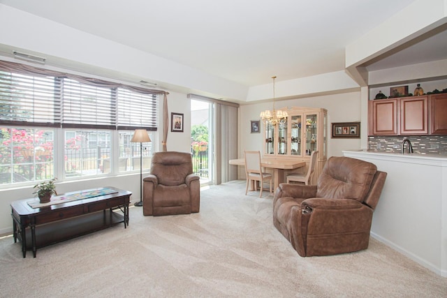 11646 Evergreen Ln, Huntley, IL 60142 - living area with a chandelier and light colored carpet