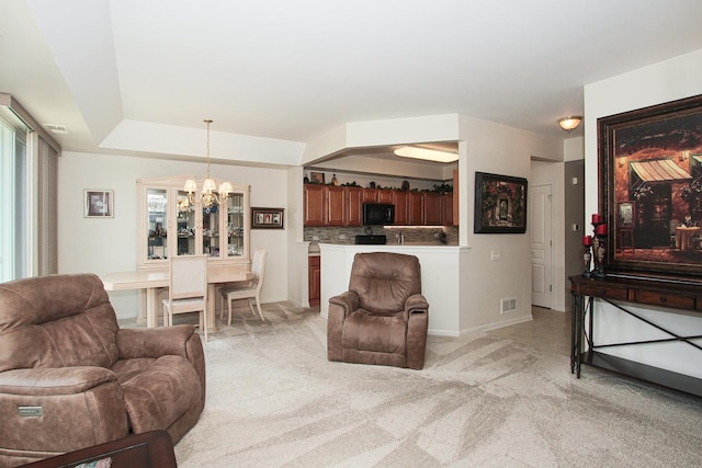 11646 Evergreen Ln, Huntley, IL 60142 - living room featuring a chandelier and light colored carpet