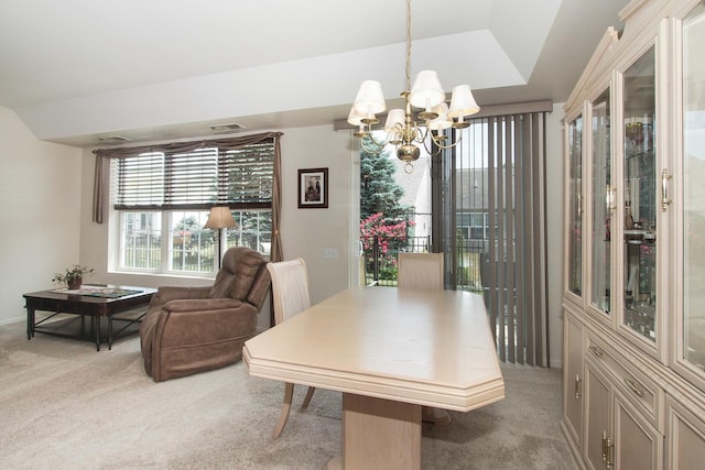11646 Evergreen Ln, Huntley, IL 60142 - dining room featuring a chandelier and light colored carpet