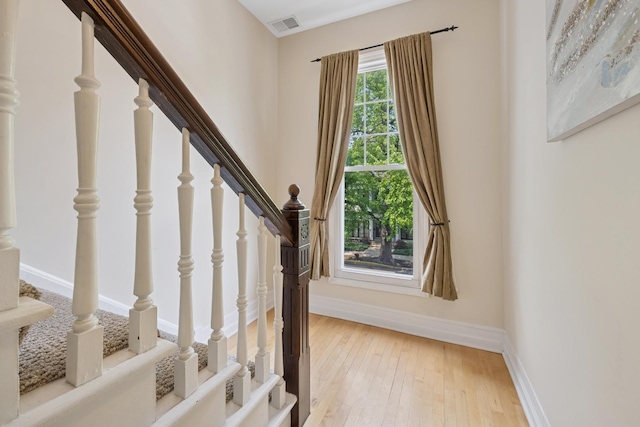1325 W Wolfram St Unit 3, Chicago, IL 60657 - stairs with wood-type flooring and baseboards