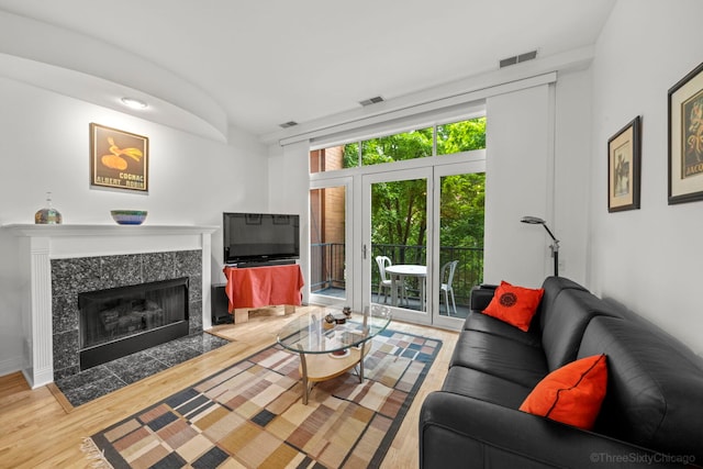 333 N Jefferson St Unit 307, Chicago, IL 60661 - living room with wood finished floors and a high end fireplace
