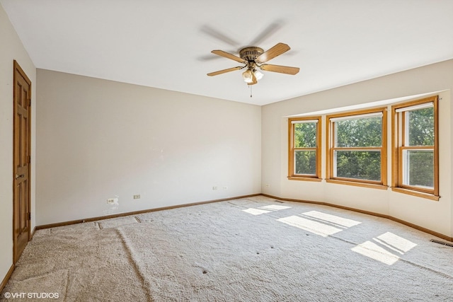 321 Greens View Dr, Algonquin, IL 60102 - carpeted spare room with baseboards and a ceiling fan