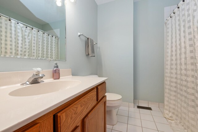 5318 W Dixie Dr Unit 10, Alsip, IL 60803 - bathroom featuring toilet, vanity, tile patterned floors, and curtained shower