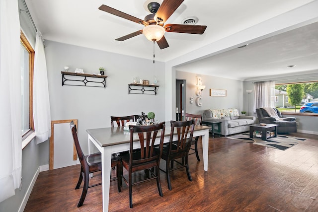 329 W Wood Ave, Peotone, IL 60468 - dining room featuring ceiling fan, wood finished floors, and baseboards