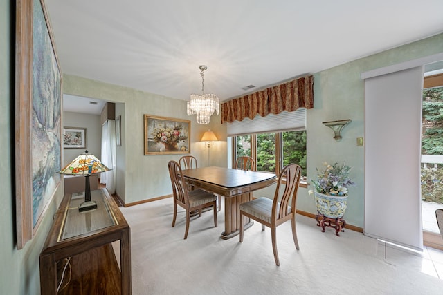8964 Dublin St Unit 12C, Orland Park, IL 60462 - dining room with a chandelier, baseboards, and plenty of natural light