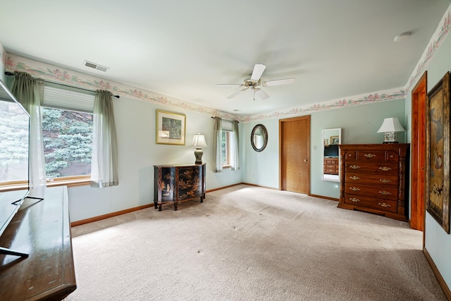 8964 Dublin St Unit 12C, Orland Park, IL 60462 - living area featuring baseboards, carpet floors, and ceiling fan