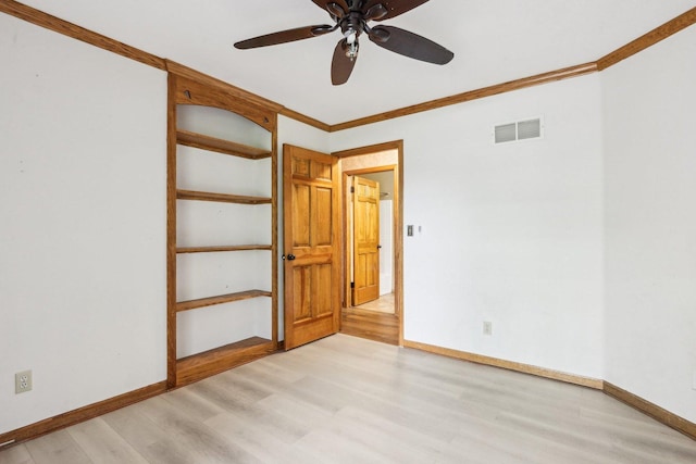 N61W14730 Woodcrest Ct, Menomonee Falls, WI 53051 - spare room featuring light wood-style floors, a ceiling fan, baseboards, and ornamental molding