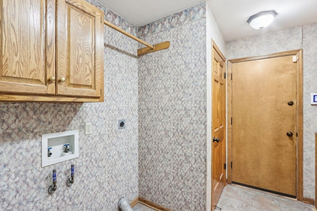 N61W14730 Woodcrest Ct, Menomonee Falls, WI 53051 - washroom featuring washer hookup, cabinet space, and electric dryer hookup