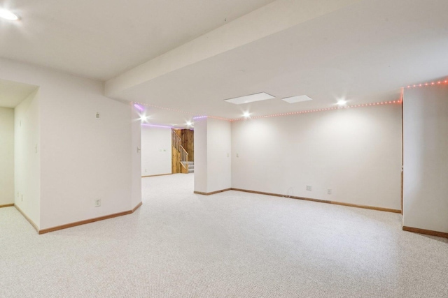 N61W14730 Woodcrest Ct, Menomonee Falls, WI 53051 - finished basement featuring carpet floors, baseboards, and stairway