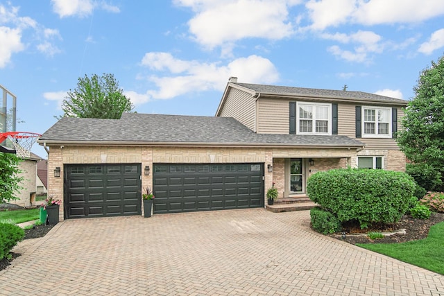 12533 Rosewood Dr, Homer Glen, IL 60491 - traditional-style home with brick siding, decorative driveway, a garage, and roof with shingles