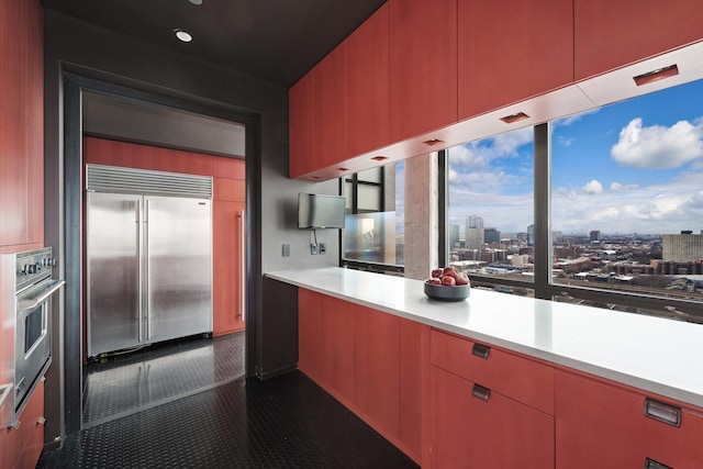 1530 S State St Unit 18A-B, Chicago, IL 60605 - kitchen with appliances with stainless steel finishes, a view of city, and light countertops