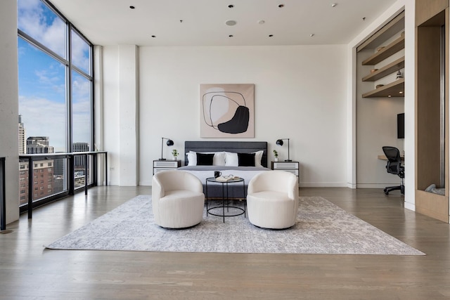 1530 S State St Unit 18A-B, Chicago, IL 60605 - bedroom featuring a wall of windows, wood finished floors, and a desk