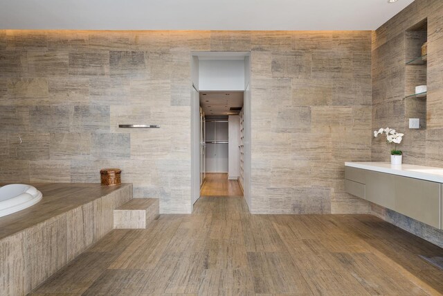 1530 S State St Unit 18A-B, Chicago, IL 60605 - bathroom with vanity, wood finished floors, and tile walls