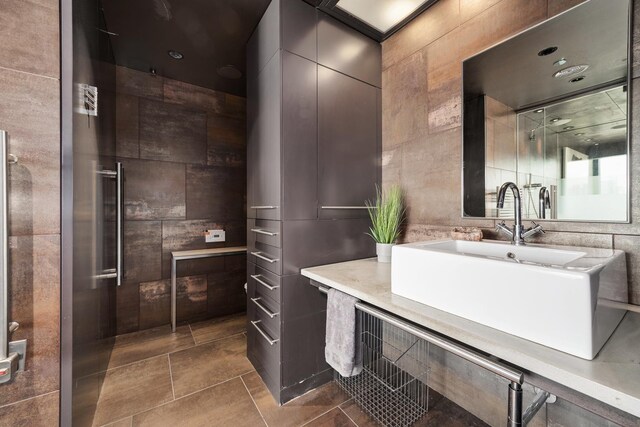 1530 S State St Unit 18A-B, Chicago, IL 60605 - bathroom featuring tile walls, vanity, and tile patterned flooring