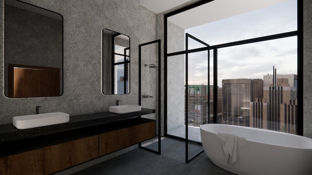 1530 S State St Unit 18A-B, Chicago, IL 60605 - bathroom with a freestanding bath, double vanity, and tile patterned floors
