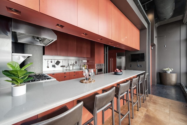1530 S State St Unit 18A-B, Chicago, IL 60605 - kitchen featuring stainless steel appliances, a peninsula, a kitchen breakfast bar, and modern cabinets