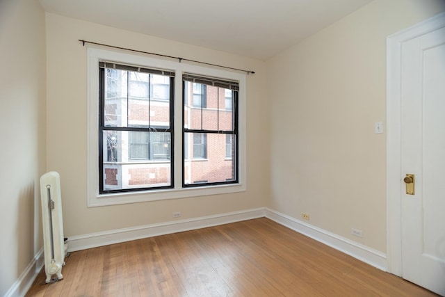 7631 N Eastlake Ter Unit 2C, Chicago, IL 60626 - unfurnished room featuring baseboards and light wood-style flooring