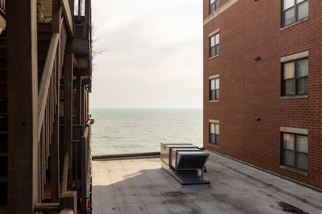 7631 N Eastlake Ter Unit 2C, Chicago, IL 60626 - view of patio with a water view