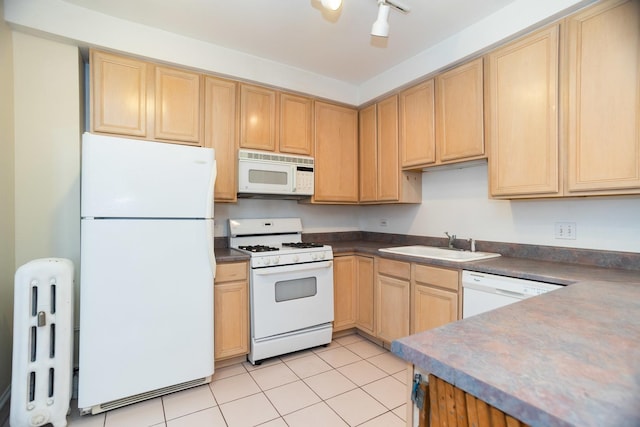7631 N Eastlake Ter Unit 2C, Chicago, IL 60626 - kitchen featuring white appliances, light brown cabinetry, a sink, dark countertops, and light tile patterned floors