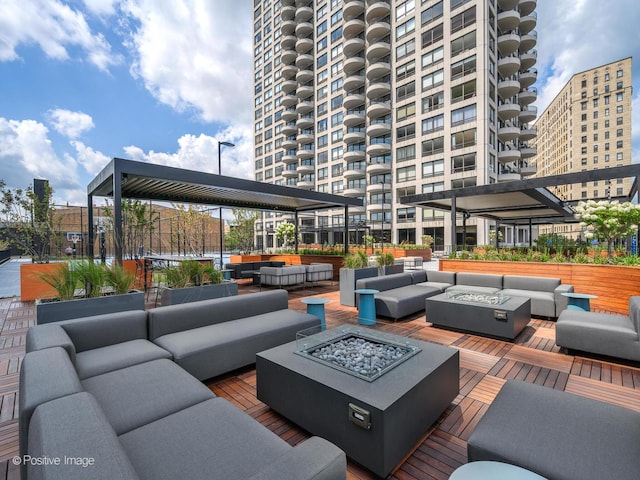 2020 N Lincoln Park W Unit 30L, Chicago, IL 60614 - view of patio with an outdoor living space with a fire pit