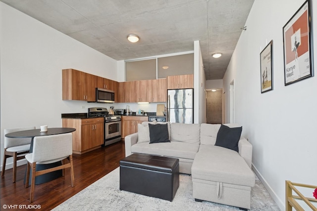 235 W Van Buren St Unit 3419, Chicago, IL 60607 - living room with dark wood-style floors and baseboards