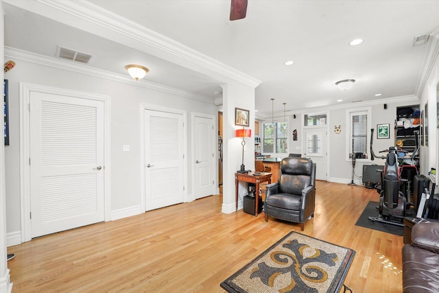 1705 N Crilly Ct Unit 2, Chicago, IL 60614 - living room with light wood finished floors, crown molding, recessed lighting, and a ceiling fan