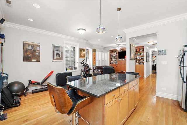 1705 N Crilly Ct Unit 2, Chicago, IL 60614 - kitchen featuring light wood finished floors, ornamental molding, recessed lighting, ceiling fan, and a kitchen island