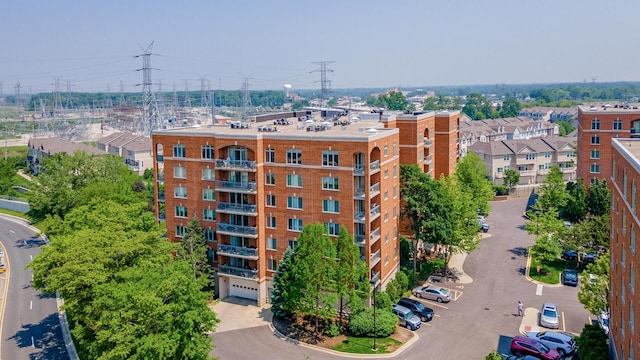 390 S Western Ave Unit 504, Des Plaines, IL 60016 - view of building exterior with uncovered parking