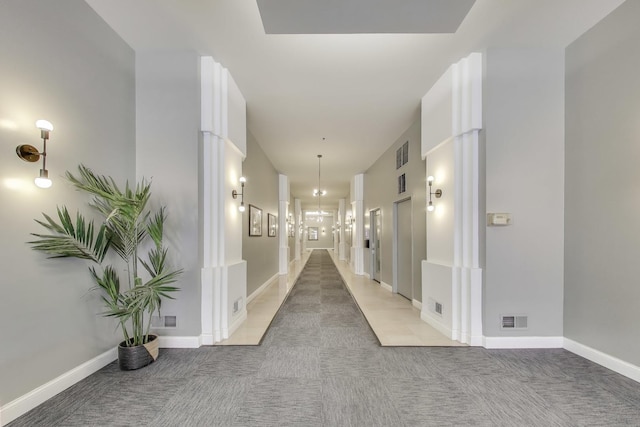 3151 N Lincoln Ave Unit 204, Chicago, IL 60657 - corridor with baseboards and light carpet