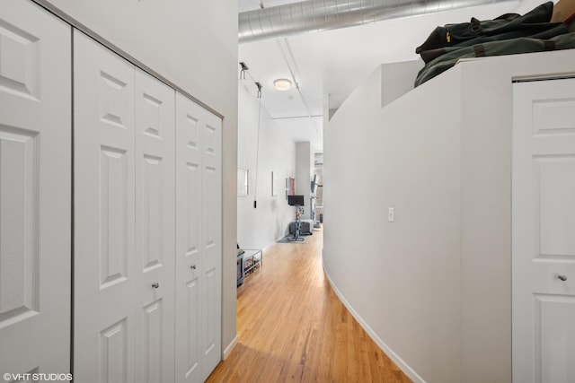 3151 N Lincoln Ave Unit 204, Chicago, IL 60657 - hallway with light wood finished floors