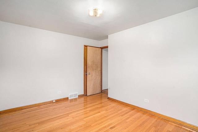 2258 177th St, Lansing, IL 60438 - empty room featuring baseboards and light wood-type flooring