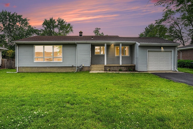 2258 177th St, Lansing, IL 60438 - ranch-style house featuring a garage, asphalt driveway, and covered porch