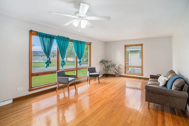 2258 177th St, Lansing, IL 60438 - living area with healthy amount of natural light, light wood finished floors, and baseboards