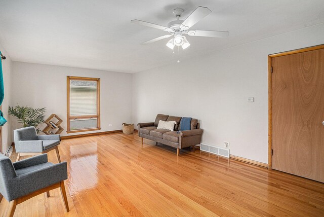 2258 177th St, Lansing, IL 60438 - sitting room with light wood-type flooring, a ceiling fan, and baseboards