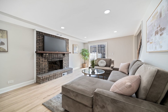 791 N Michigan St, Elmhurst, IL 60126 - living area featuring wood finished floors, baseboards, a fireplace, and recessed lighting