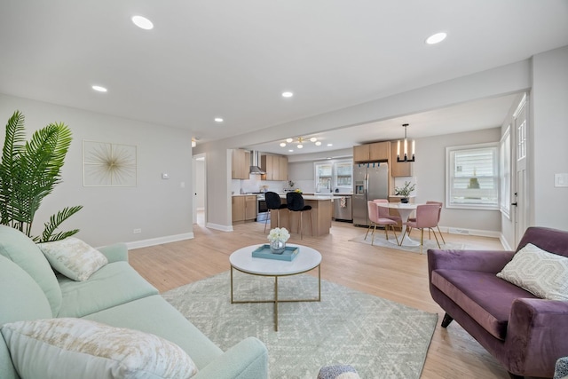 791 N Michigan St, Elmhurst, IL 60126 - living room with baseboards, light wood-type flooring, and recessed lighting
