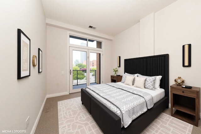 330 N Clinton St Unit 303, Chicago, IL 60661 - bedroom with access to outside, light colored carpet, and baseboards