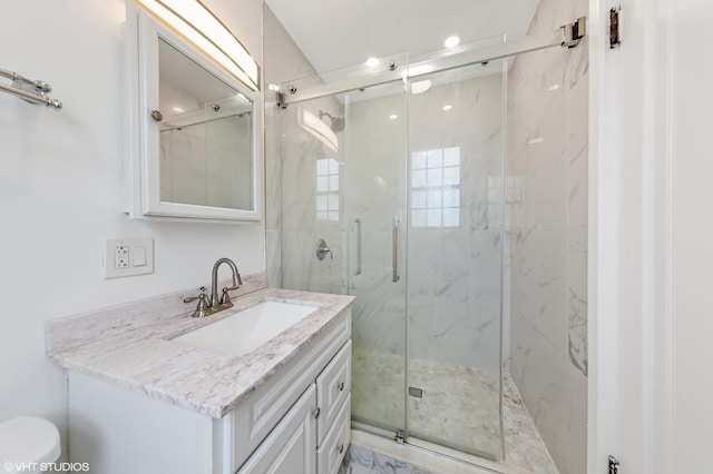 6901 S Oglesby Ave Unit 2A, Chicago, IL 60649 - full bathroom featuring a marble finish shower, vanity, and toilet