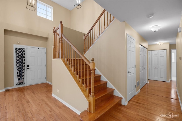 2539 Lexington Ln, Naperville, IL 60540 - stairway featuring wood finished floors and baseboards