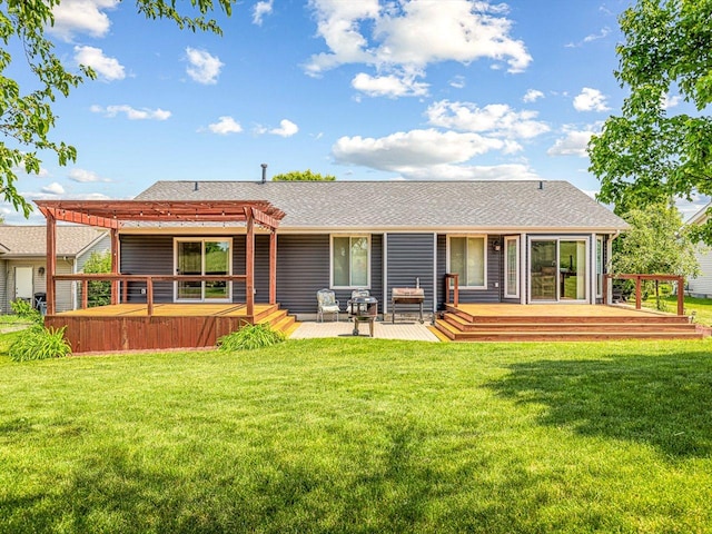 4306 Westridge Dr, Winnebago, IL 61088 - back of property featuring a pergola, a jacuzzi, a wooden deck, and a yard