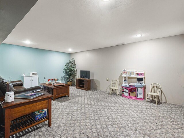 4306 Westridge Dr, Winnebago, IL 61088 - game room with carpet floors and recessed lighting