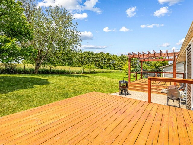 4306 Westridge Dr, Winnebago, IL 61088 - deck with a pergola and a yard