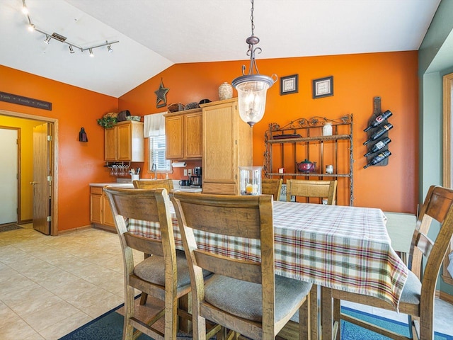 4306 Westridge Dr, Winnebago, IL 61088 - dining room featuring vaulted ceiling and light tile patterned floors