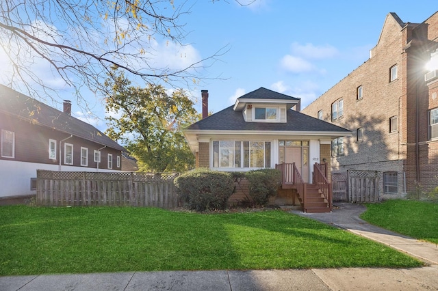 212 S Austin Blvd, Oak Park, IL 60304 - bungalow featuring a chimney and roof with shingles