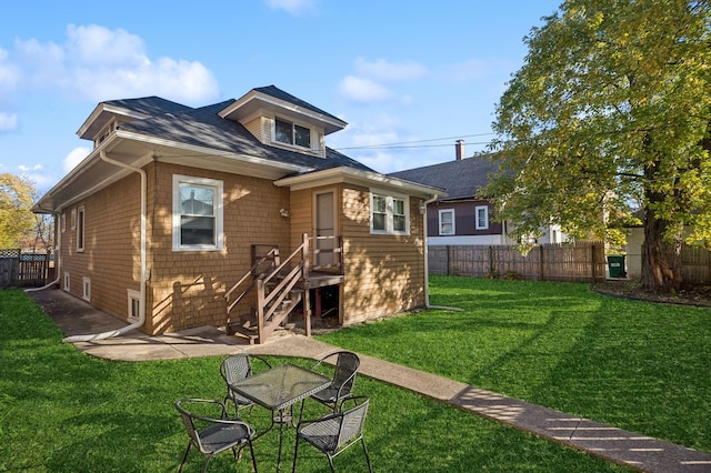 212 S Austin Blvd, Oak Park, IL 60304 - back of house featuring a shingled roof