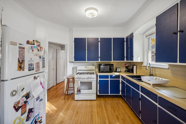 212 S Austin Blvd, Oak Park, IL 60304 - kitchen with white appliances, blue cabinetry, light countertops, light wood finished floors, and crown molding