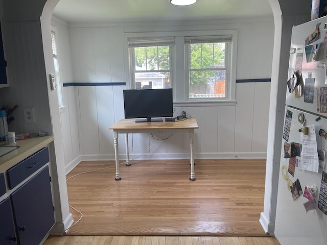 212 S Austin Blvd, Oak Park, IL 60304 - office with a decorative wall, arched walkways, and light wood finished floors
