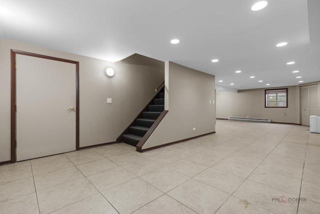 43 Kings Cross Dr, Lincolnshire, IL 60069 - below grade area with a baseboard heating unit, stairs, recessed lighting, and baseboards