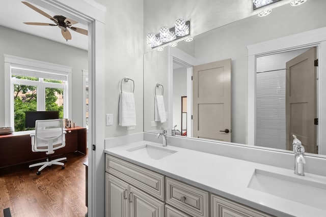 6336 S Kimbark Ave, Chicago, IL 60637 - bathroom featuring double vanity, wood finished floors, and a ceiling fan